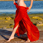 Second pic of Skinny young Anita E strips at the beach to flaunt firm tits and bald pussy