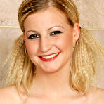 Third pic of Smiley blonde amateur floosie exposing her slender curves in the bathroom