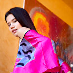 Second pic of Dark haired teen Evelin Elle casts off a dress to model in the nude