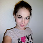 First pic of Cute brunette Emily undressing to take self shots of her bare tits and hot ass