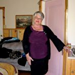 First pic of Fat granny Girdle Goddess exposes her pussy in crotchless panties and a girdle