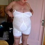 Fourth pic of Fat granny Girdle Goddess exposes her pussy in crotchless panties and a girdle