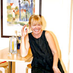 First pic of Chubby granny in glasses Sandra AA stripping off her dress and panties