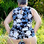 First pic of Silver haired granny Savana gets naked outdoors on a blanket in stockings