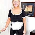 First pic of Blonde nan Judy Mayflower steps out of her French maid attire for nude poses