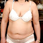 First pic of Fatty granny taking off her lingerie and posing in white stockings