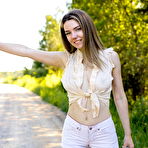 First pic of Pretty teen Kiere exposes her great body while hitchhiking on a dirt road