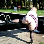 Third pic of Overweight blonde Lexie Cummings exposes herself by locks on a canal system