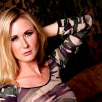 Second pic of Blonde chick Sam Tye gets naked in black boots while in a military bunker