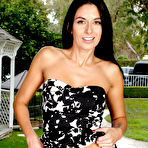 First pic of Sexy MILF Nikki Daniels parts her pussy lips with her fingers in the backyard