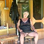 Second pic of Obese nan Girdle Goddess unleashes her saggy boobs as she disrobes to hose