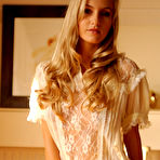 First pic of Hot blonde Natasha Anastasia bares her firm tits in a thong and cowgirl boots