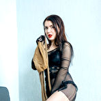 First pic of Fair skinned girl covers herself and strapon cock in layers of pantyhose